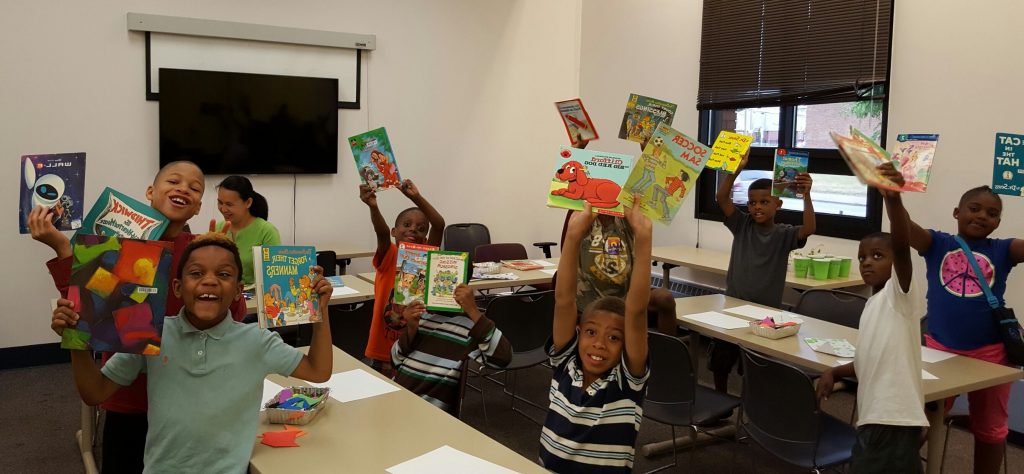 Students at Marion Sterling School rejoice at receiving books from the Cleveland Kids' Book Bank
