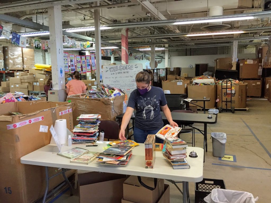 Cleveland Kids' Book Bank volunteer wearing a mask