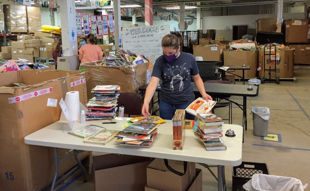Cleveland Kids' Book Bank volunteer wearing a mask