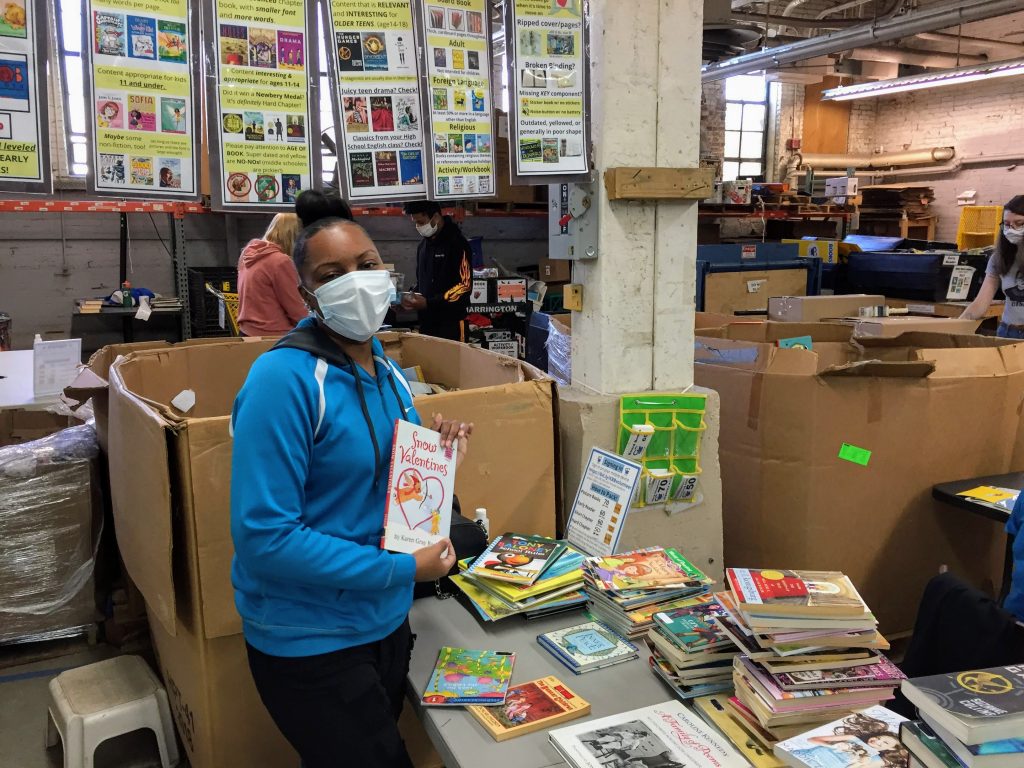 Cleveland Kids' Book Bank volunteer packing books