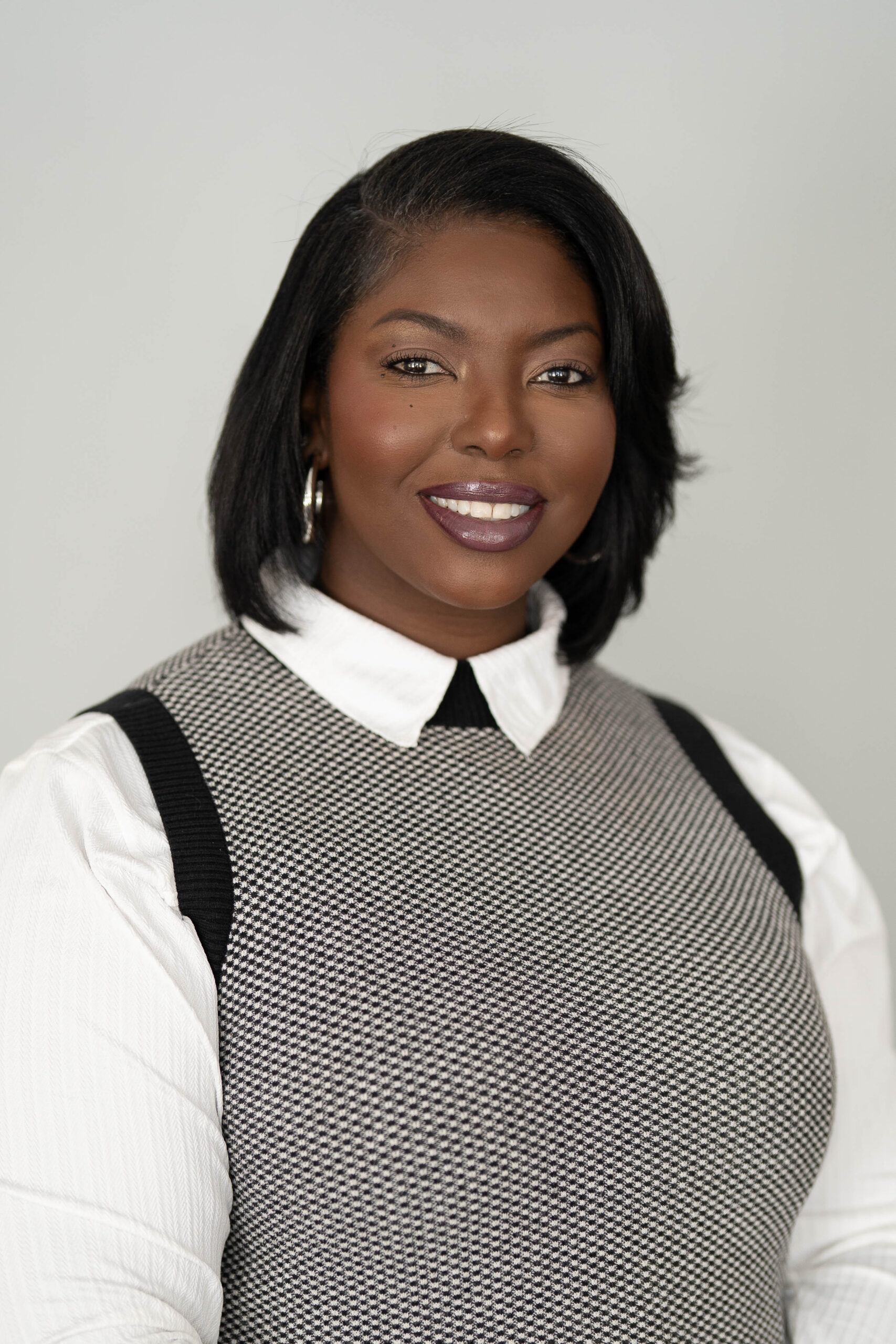 smiling woman with dark hair